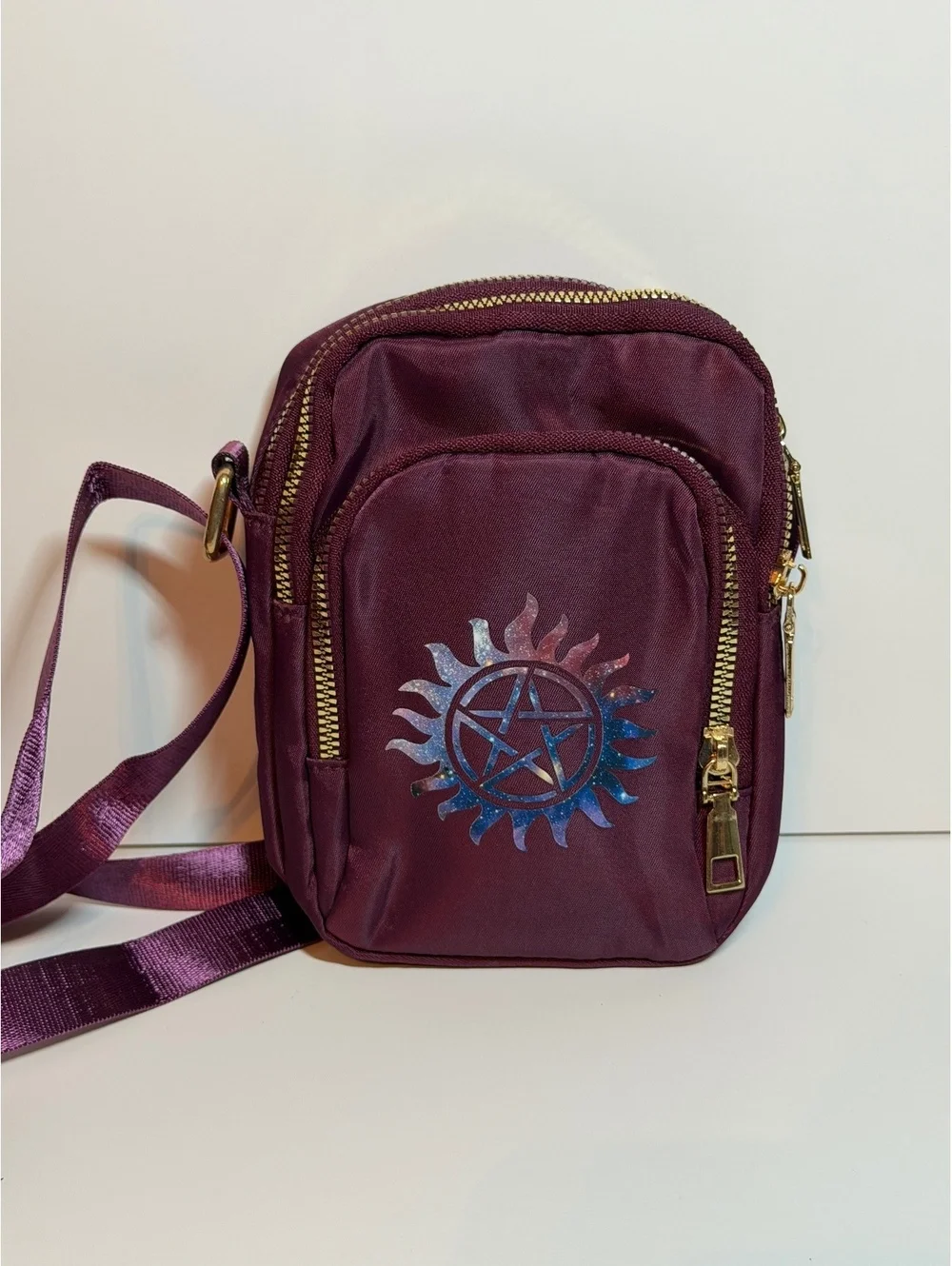 Maroon small crossbody bag with anti possession symbol from Supernatural. New